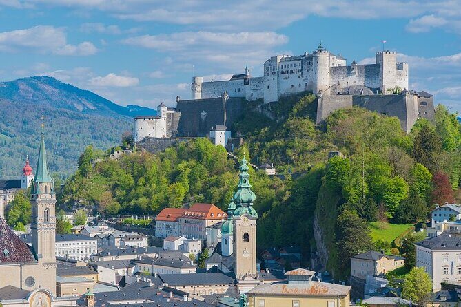 Private Full Day Trip to Hallstatt ,Salzburg and Melk from Vienna - Traunsee: a deep-lake pause with big-mountain scenery