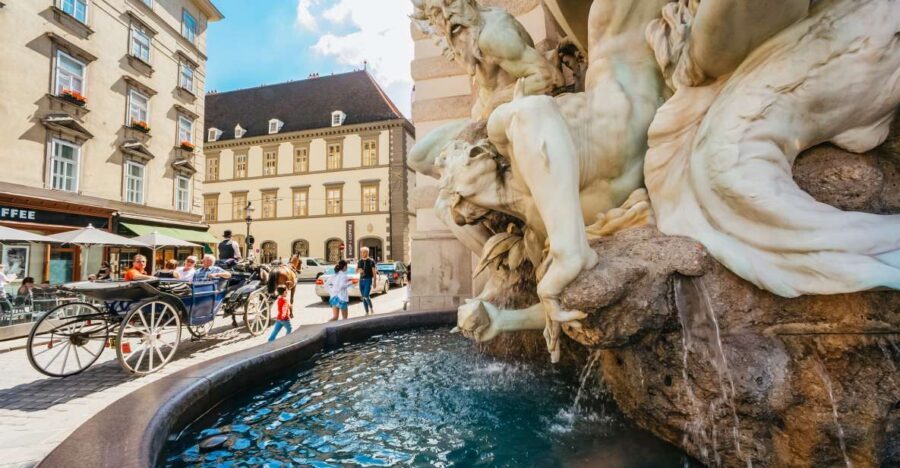 Vienna: Guided Walking Tour of City Center Highlights - The Hofburg exterior: power without the ticket line